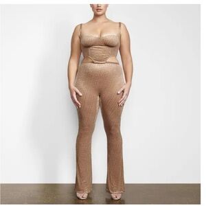 SKIMS women’s velvet logo flared chai gusset sheer nylon blend M leggings